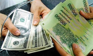 Ngân hàng bất ngờ tăng tỷ giá